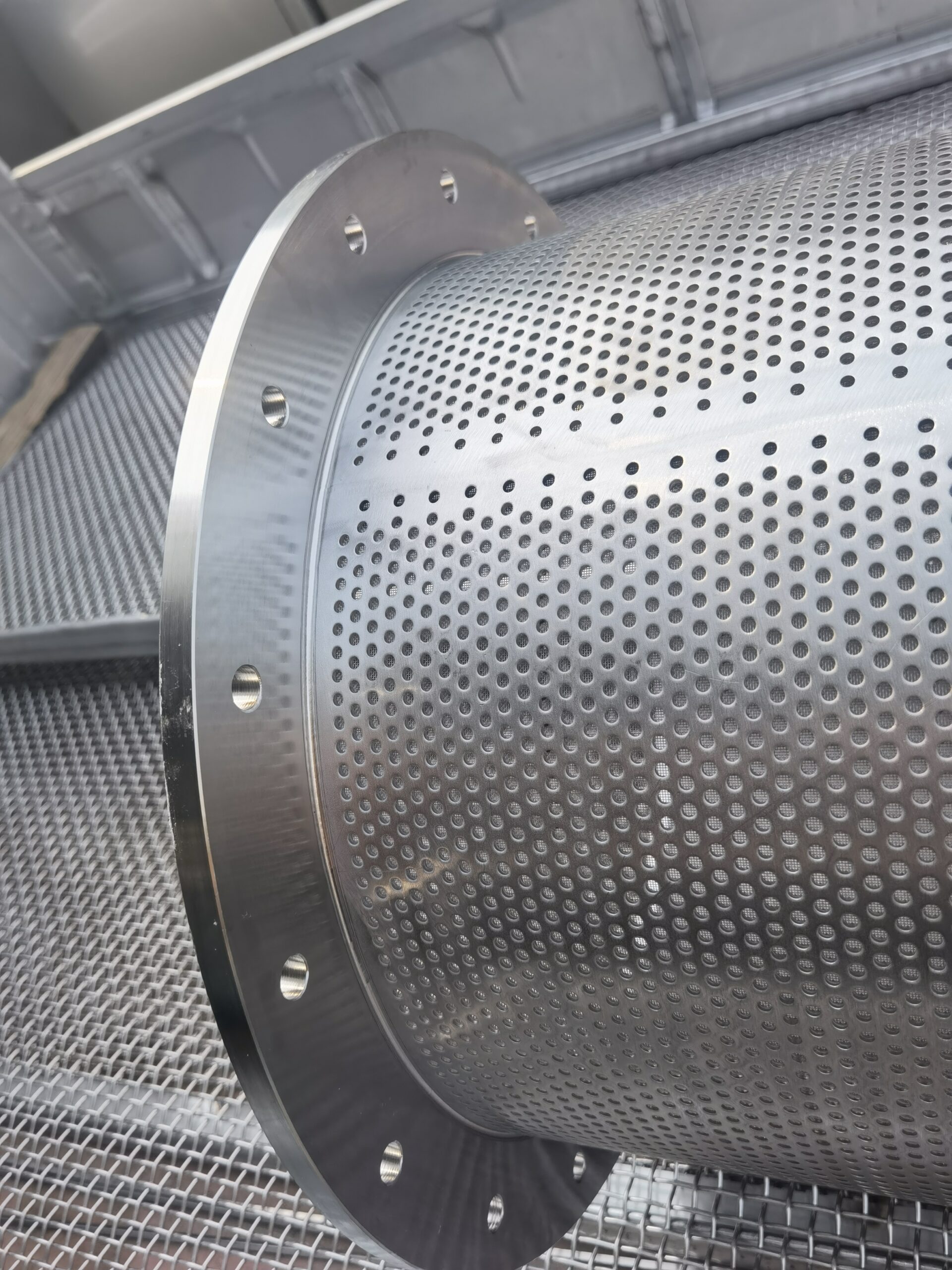 Perforated metal filter tube